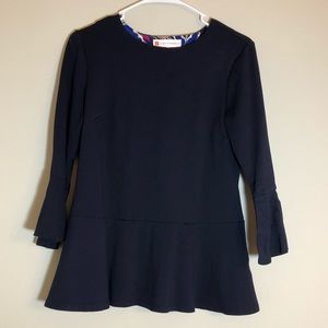Navy bell sleeve peplum shirt.
